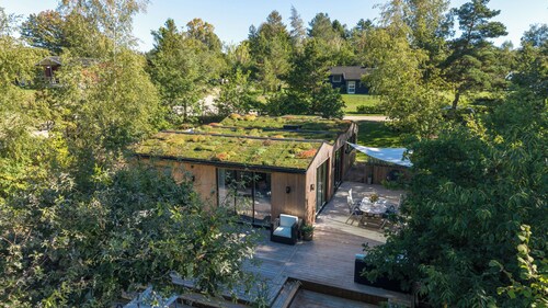 Renovated cabin inspired by classic seaside hotels
