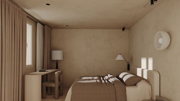 Une chambre à coucher avec un lit, des tables de chevet, un bureau et une chaise.