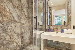 A bathroom with two sinks, a glass shower enclosure, and a large mirror. - Sublim Apartment AC St Germain Luxembourg Park (Paris)