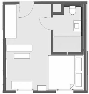 A floor plan with a kitchen, dining area, two bedrooms, a bathroom, and a living room. - NOX Hotel Zimmer 2 Nautic (Walzbachtal)
