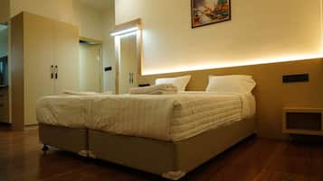 Deluxe Double Room, Balcony, City View | Desk, laptop workspace, iron/ironing board (on request), free WiFi