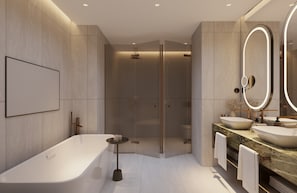 Un baño moderno con una bañera independiente, una ducha con mampara de vidrio y un tocador con dos lavabos y un espejo grande.