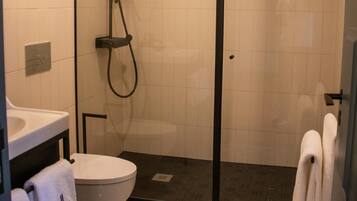 Deluxe Apartment, 2 Bedrooms, City View | Bathroom | Shower, towels, soap, shampoo