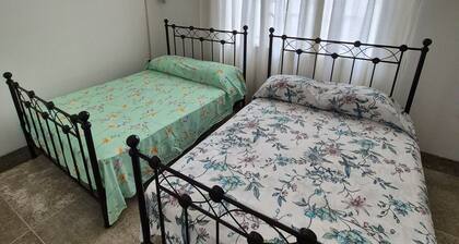 Marvelous 1-bedroom in a 5 bedroom 2 bath house with AC in vibrant Woodbrook.