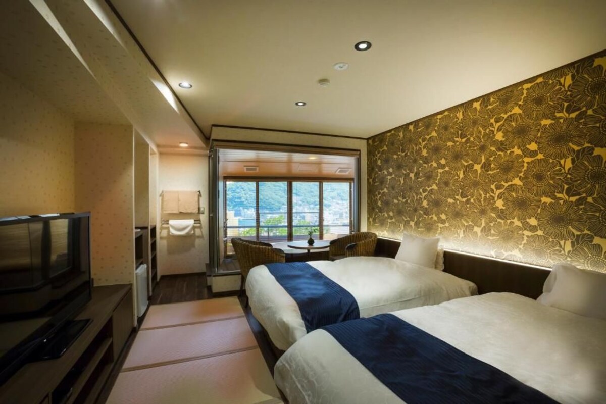 Quarto duplo luxo, vista para a cidade | Cofres nos quartos, Wi-Fi de cortesia