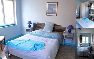 Quarto com cama, mesas de cabeceira, abajur, quadro emoldurado e janela.