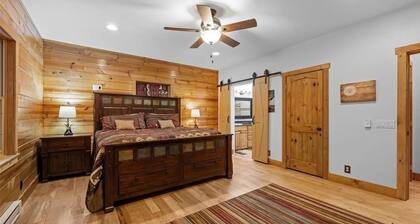 Livin' Lodge creekside log home steps away from hiking, biking and ski resorts