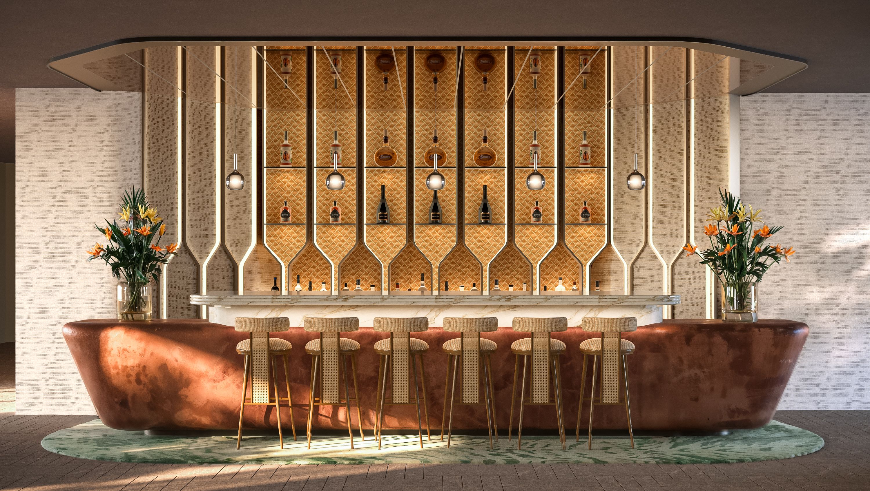 A bar area with a marble countertop, wicker chairs, and a patterned wall with bottles.