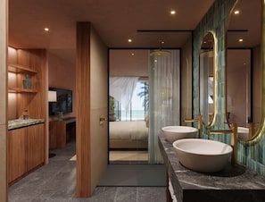 Une salle de bain moderne avec un grand miroir, deux lavabos et un espace douche.