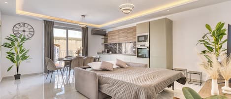 Apartment, Balcony, City View | Blackout drapes, iron/ironing board, WiFi (free)