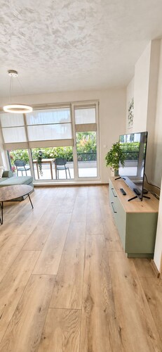 Stylish Apartment with Private Parking & Large Green Terrace
