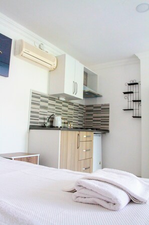 Quarto, vista para a cidade | Cozinha privada