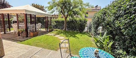 Apartment, Patio, Garden View | Outdoor dining