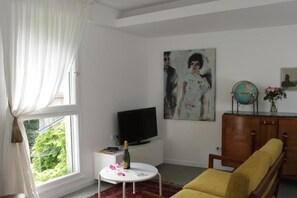 Appartement Supérieur, vue jardin | Coin séjour