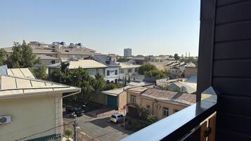 Standard Triple Room, 3 Twin Beds, Balcony, City View | Property grounds