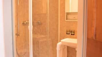 Standard Double Room | Bathroom | Shower, hair dryer, towels, toilet paper