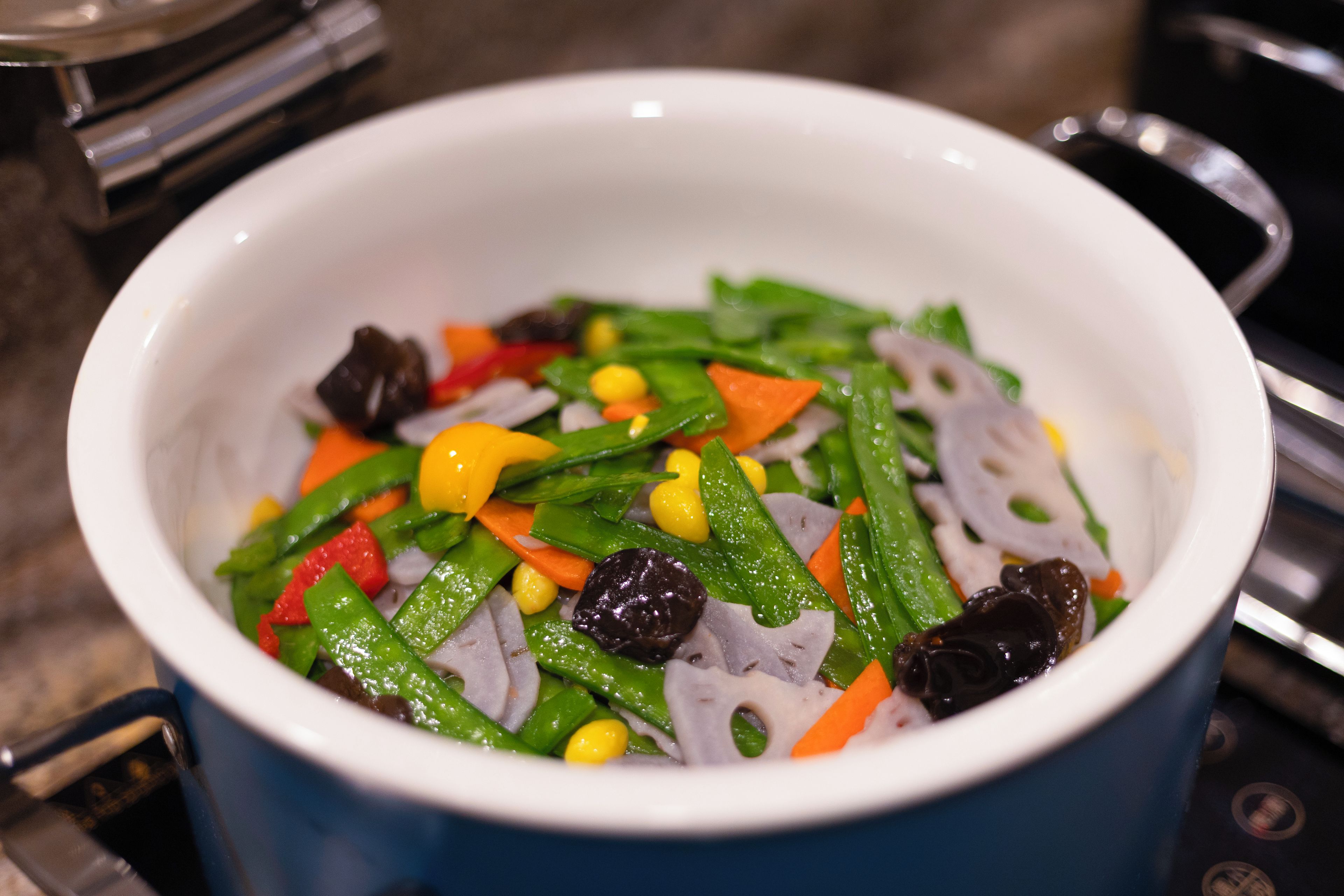 A bowl of mixed vegetables.
