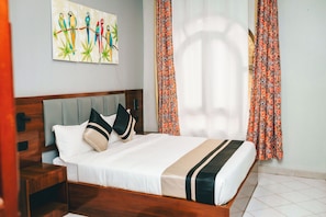 Deluxe Double Room, Garden View | Iron/ironing board (on request), WiFi (free) - Neza House (Kigali)