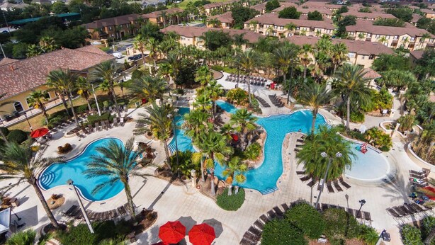 Outdoor pool, a heated pool - Spacious Modern Resort Townhome Sleeps 10 with Pools, Lazy River and Near Disney (Davenport)