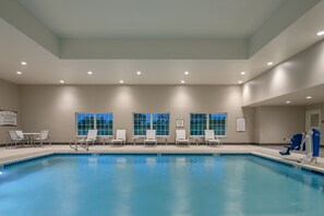 A swimming pool with white lounge chairs and a no diving sign on the wall. - 1 Bedroom King Suite w/ Full Kitchen + Breakfast (Hillsboro)