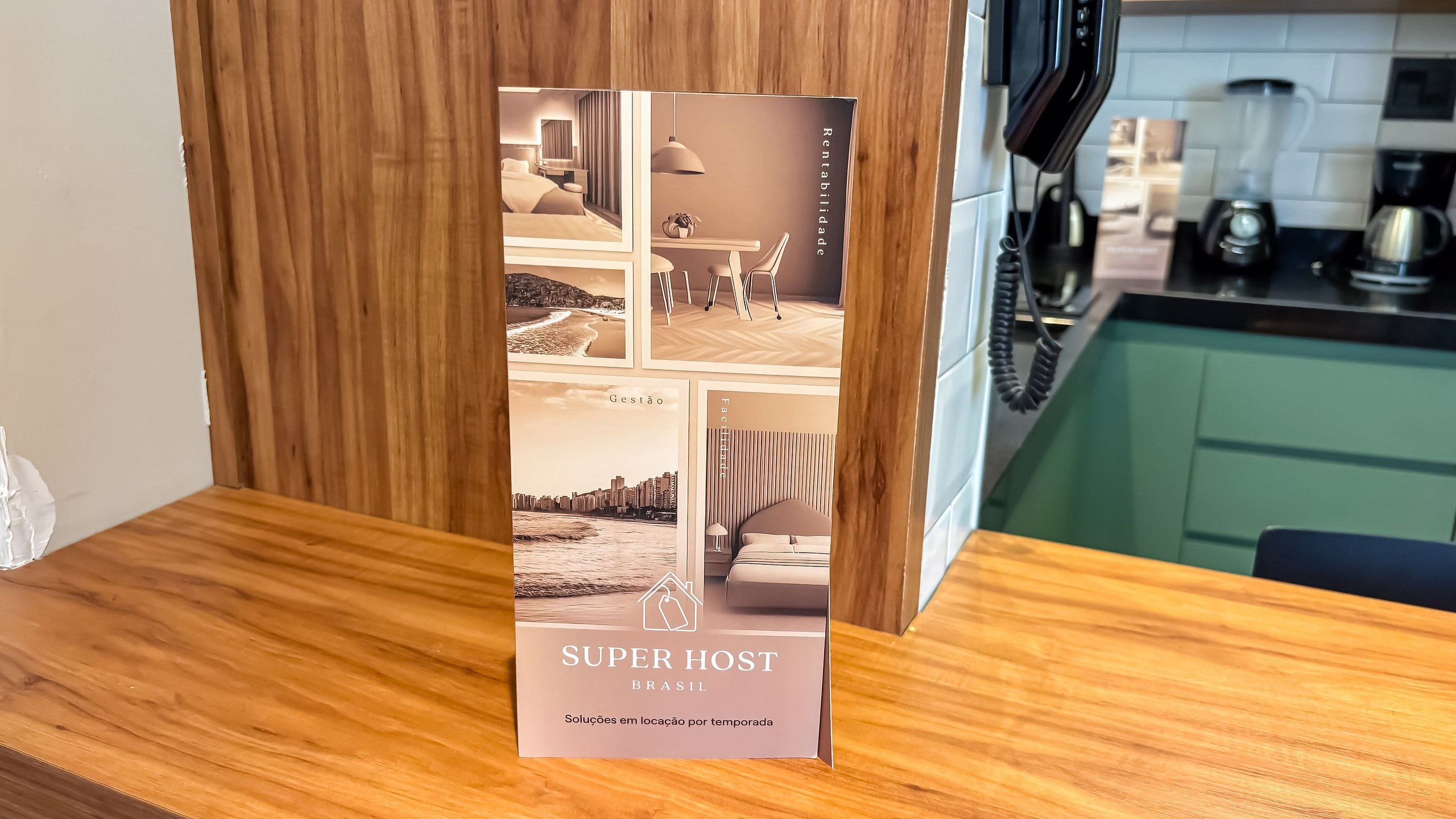 A brochure titled 'SUPER HOST BRASIL' with temporary location images of a hotel room, a beach view, and a cityscape.