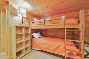 A bunk bed with a headboard and a shelf unit beside it. - The Overlook, Lake Wallenpaupack, Boat Slip+Kayak, Private Dock (Greentown)