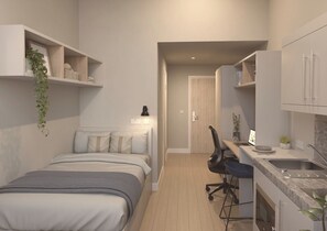 A compact bedroom with a bed, bedside table, and a hanging plant. - Student Only Glasgow Citi View (Glasgow)