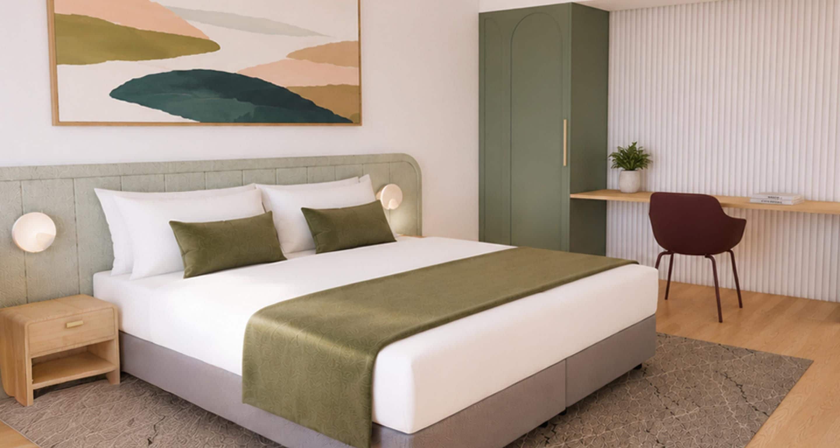 Ein modernes Schlafzimmer mit einem Bett, Nachttischen, einem Schreibtisch, einem Stuhl und einem Wandregal.