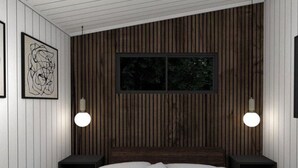 Ein Schlafzimmer mit einer Wand aus Holzlatten, einem Bett mit weißer Bettwäsche, zwei Nachttischen und zwei Wandlampen.