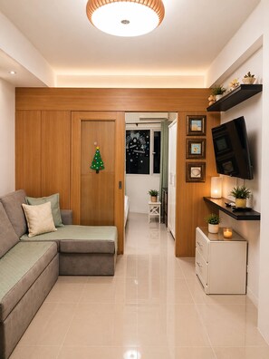 Departamento, 1 habitación, vista a la ciudad | Sala de estar