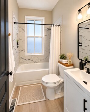 Bathroom - Brick & Olive Stylish Soulard Retreat Near Downtown (St. Louis)