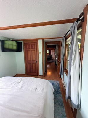 Room - Cozy lakefront cottage - dock, kayaks, fire pits, queen bed + air mattress (BELFAIR)