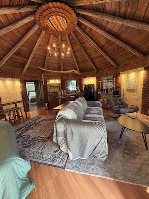 Living area - Cozy lakefront cottage - dock, kayaks, fire pits, queen bed + air mattress (BELFAIR)