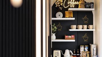 A coffee-themed display with shelves, coffee cups, and a coffee machine.