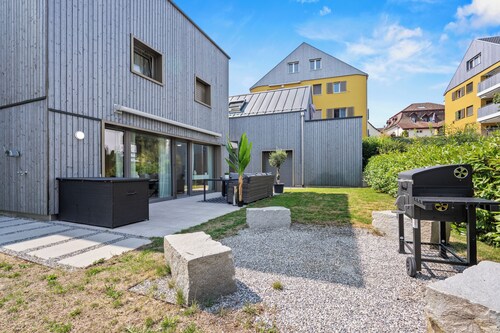 Vacation Home Dreams: Garden Apartment on Lake Constance—Includes Underground Parking, Garden, and Terrace