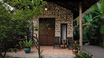 Deluxe Bungalow, Patio, Garden View | Terrace/patio