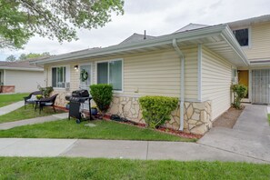 A residential house with a front porch, a grill, and a small garden. - Cozy Condo 6 Mi to Downtown Reno! (Reno)