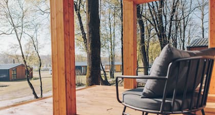 Treat yourself to views of the lake and greenery while you relax in your private hot tub!