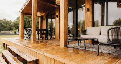 Treat yourself to views of the lake and greenery while you relax in your private hot tub!