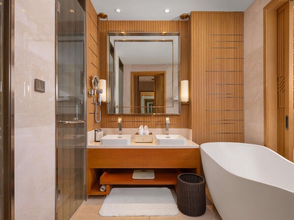 A modern bathroom with a large mirror, two sinks, a bathtub, and a shower area. - The View Hotel Changbai Mountain - Mgallery Collection (Baishan)