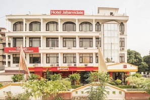 A hotel with a name sign, a restaurant, and a banquet hall. - Hotel Jhanvi Dale (Haridwar)