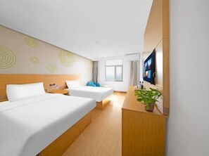 A hotel room with two beds, a desk, a TV, and a window. - Greentree Inn Binzhou Wudi Ginza Square Express Hotel (Binzhou)