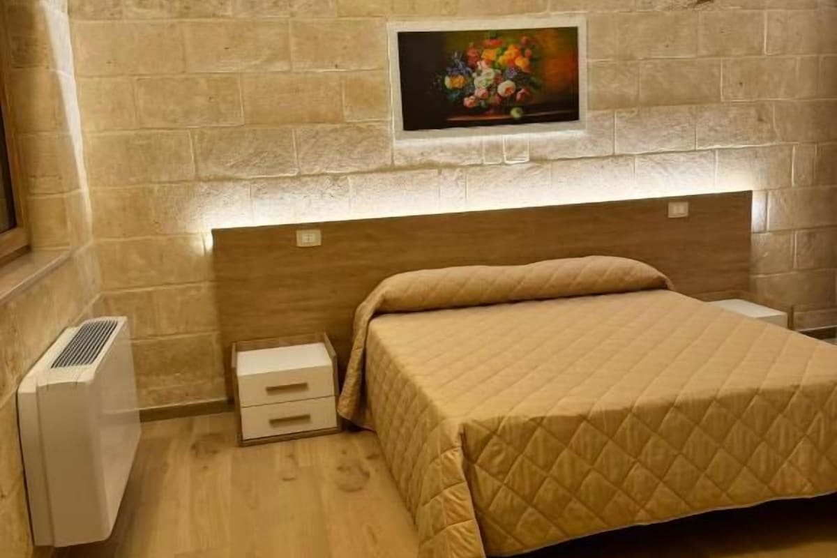 Habitación doble Deluxe, patio, vista al jardín | Escritorio y wifi gratis