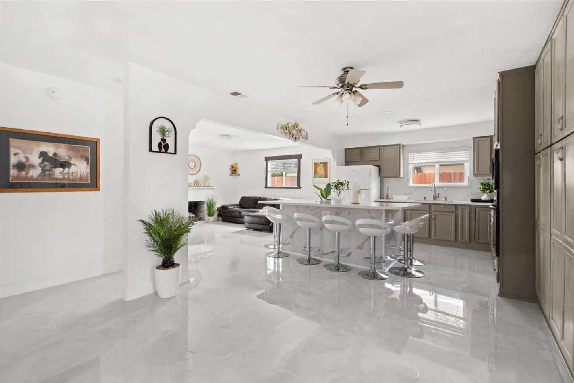 A fully stocked kitchen with generous counter space for cooking for a crowd.