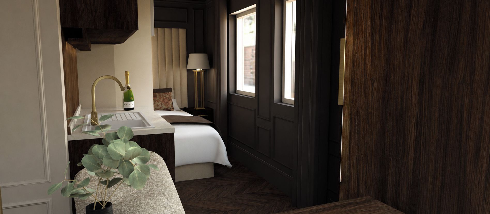 Une chambre d’hôtel avec un lit, une table de chevet, une lampe, une bouteille de champagne et une plante en pot.