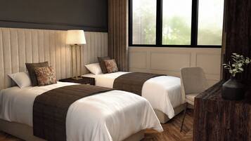 A hotel room with two beds, a bedside table with a lamp, a chair, and a window with a view of trees.