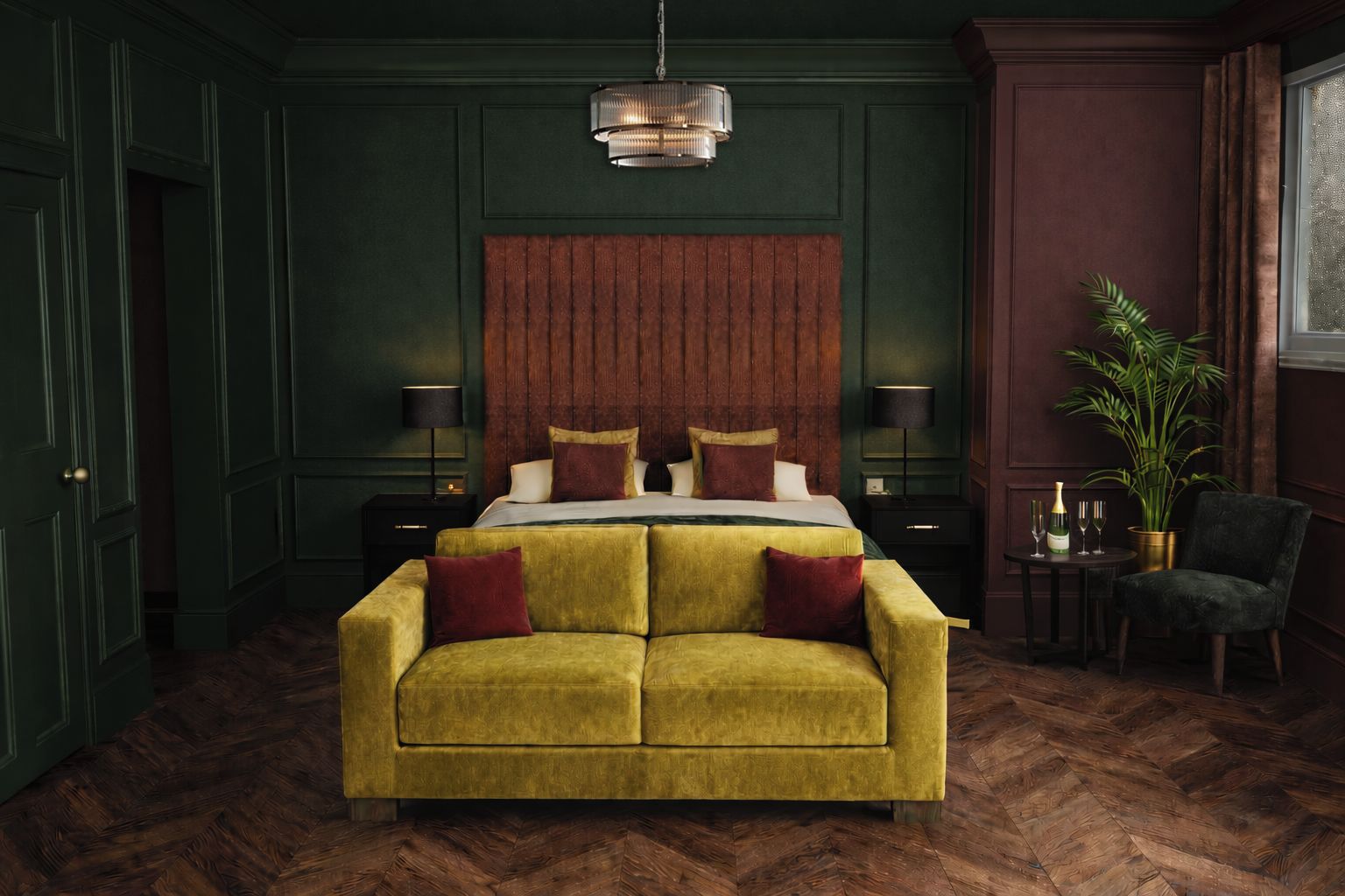 A room with a large bed, a sofa, a wooden floor, a wall-mounted light fixture, and a potted plant.