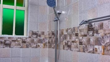 Shower, free toiletries, slippers, towels