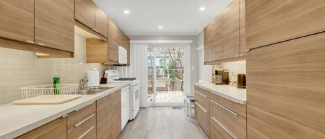 Sleek, minimalist design meets functionality. Fully equipped with modern appliances and ample counter space for your culinary creations.