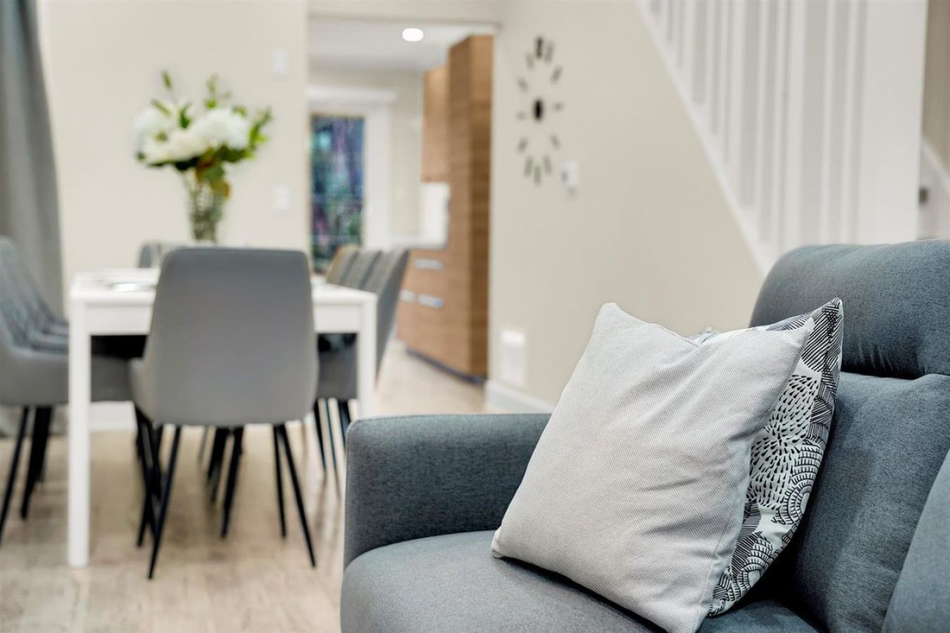 Bright and airy open-concept living area, seamlessly connecting the dining space for social gatherings.